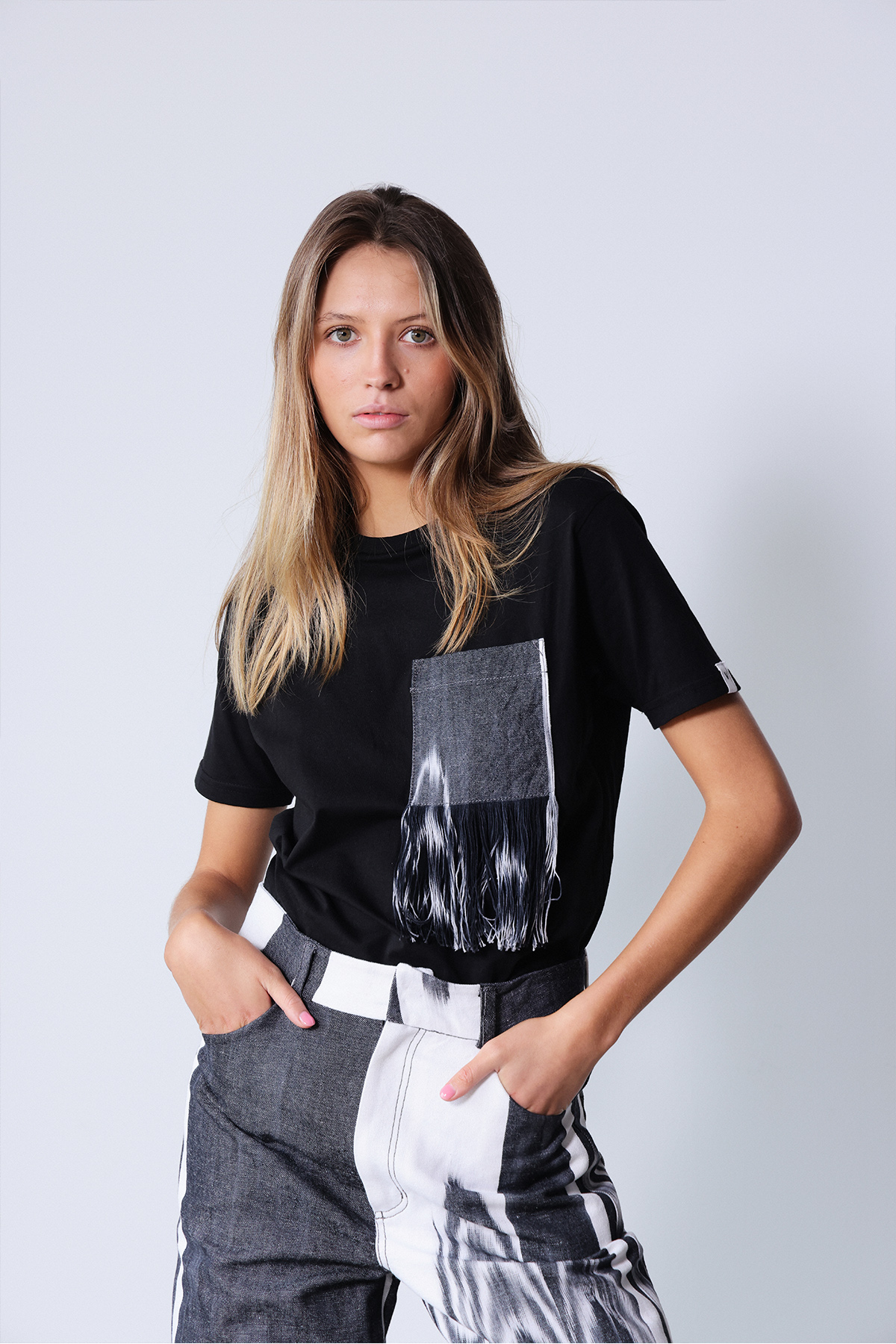 Samarreta negra Butxaca tela ikat serrell 124 negre